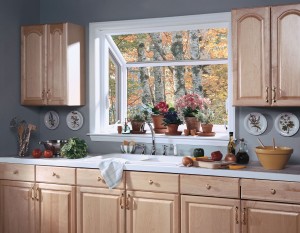 Interior view a kitchen garden greehouse window above a sink Interior view a kitchen garden greehouse window above a sink