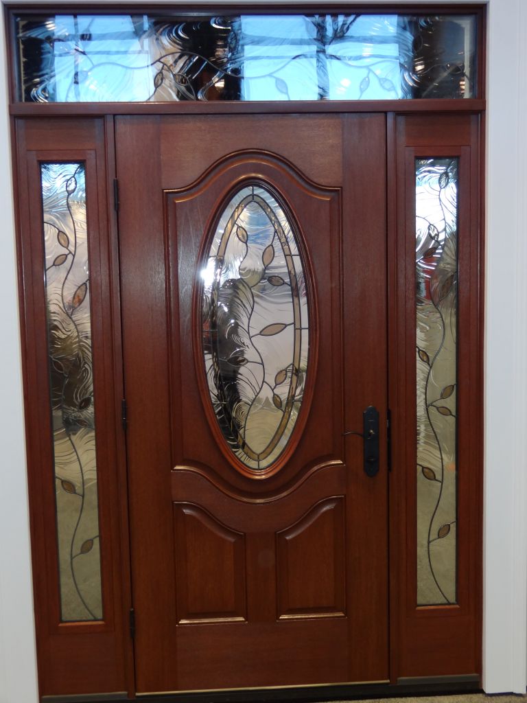 Decorative door glass in a front door sidelight and transom