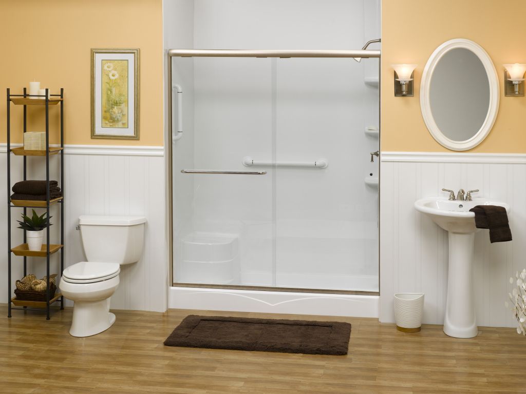 Tub replacment with acrylic shower wall surrounds and a framed glass shower bi pass door