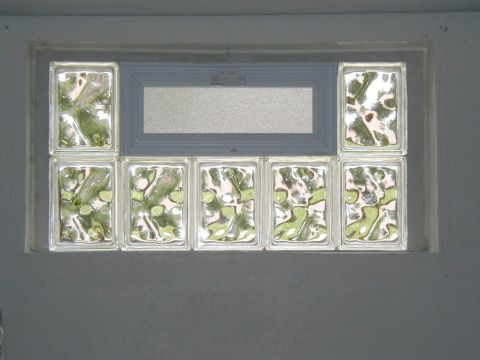 Glass block basement window with air vent