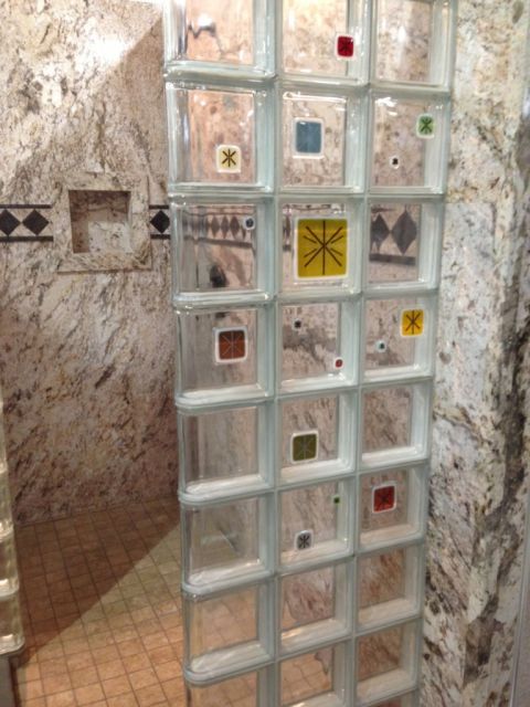 Decorative glass tile block shower wall with Sentrel wall surrounds