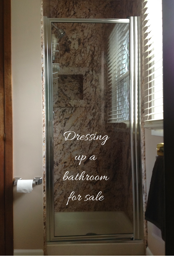 Decorative shower wall panels being used to dress up this Bath Ohio home for sale