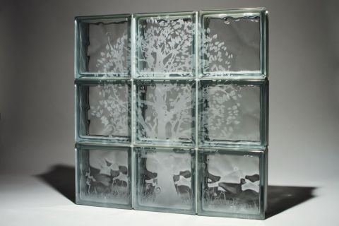 Etched tree mural in glass blocks