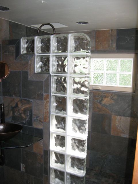 Glass block wall with top finished with end blocks