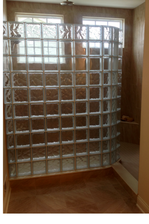 Glass block walk in shower in Truberry Jerome Village model