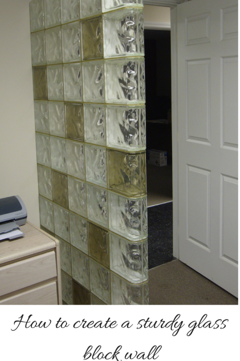 Glass block wall anchored for stability