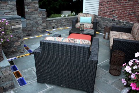 Colored glass brick and bluestone hardscape patio design in Guilford Connecticut