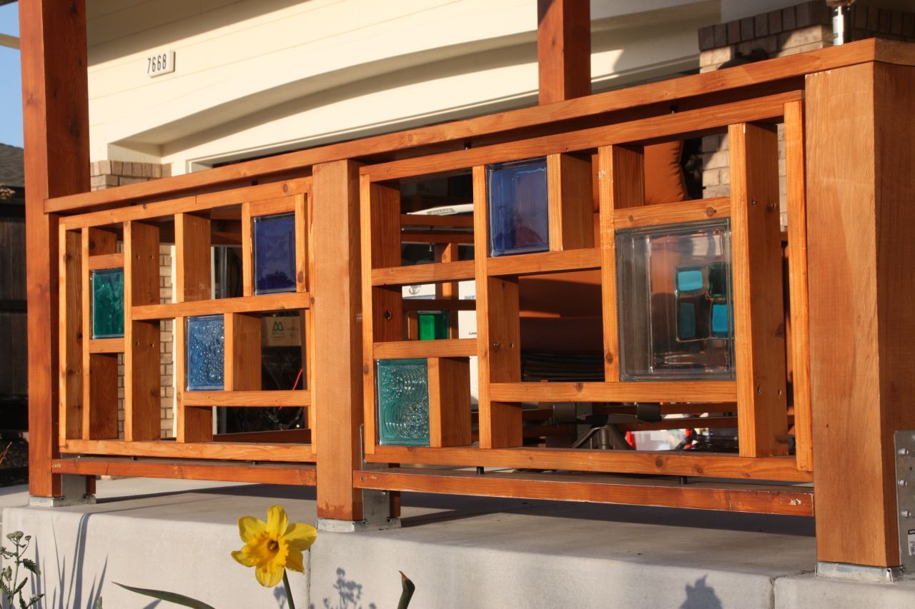 Decorative front porch railing with glass blocks