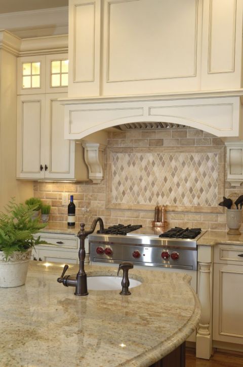 Kitchen remodeling with stainless steel oven maple cabinetry