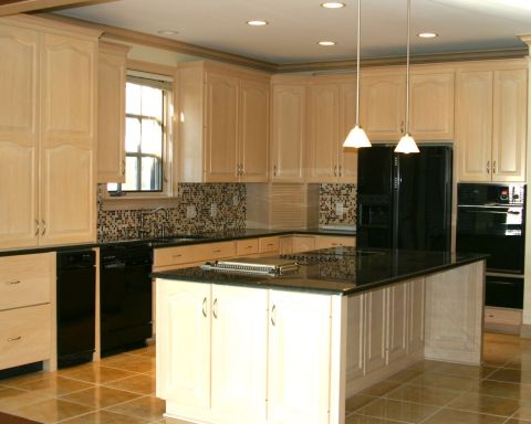 Kitchen island with black countertops