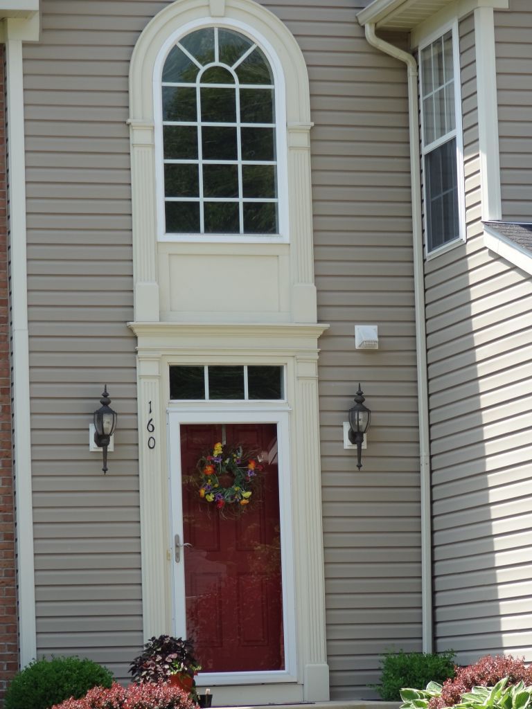 Arched window to add light into a 2 story foyer