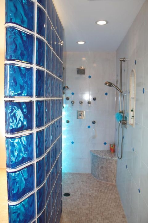 Caribbean themed blue colored glass block and tile shower