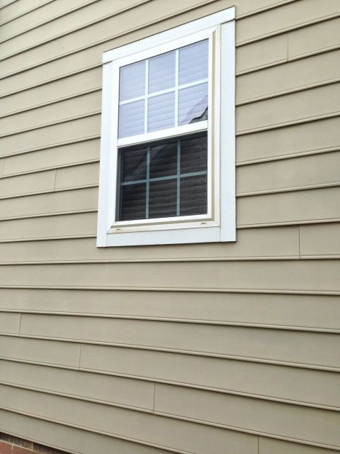 Vinyl framed window in a framed home