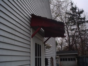 Before - Wood Door Awning Rotting & Away from House Before - Wood Door Awning Rotting & Pulling Away from House