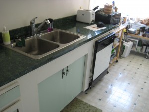 Before picture main countertop area of a small kitchen 