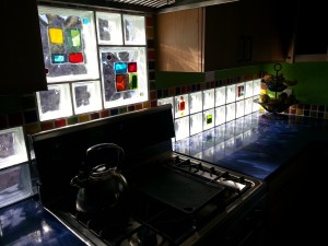 Glass tile blocks in a kitchen backsplash