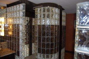 Snail shaped glass block walk in shower with colored and curved glass blocks in Washington