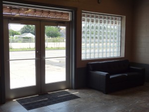 Clear and Wavy Glass Blocks in Front Entrance of 45 Degree Cycles