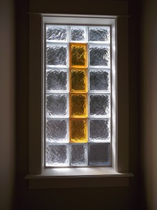 Clear and Colored Glass Blocks around a toilet room window