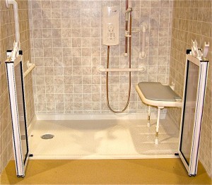 Accessible shower accessories fold down seat grab bar and hand held shower