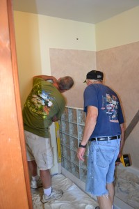 Installation of thinner series curved glass block shower wall sections by Stu and Barry 