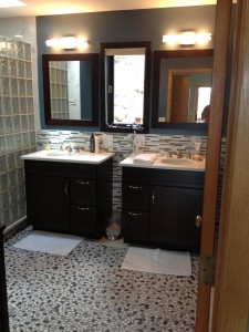 His and hers bathroom vanities to match master bedroom woodwork