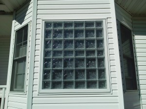 Outside view of glass block window with smooth outside face and frosted inside face 