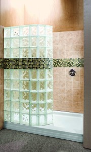 Curved 60 x 34 glass block shower with a tile row and an acrylic base 