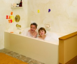 2 kids enjoying a new bathtub using an acrylic liner