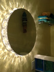 Light and mirror combination in a half bathroom 