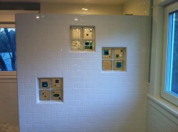 Decorative glass tile blocks accent the colors of the room 