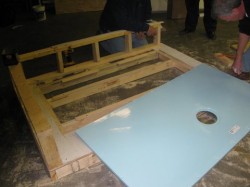 Glass reinforced plastic shower base 