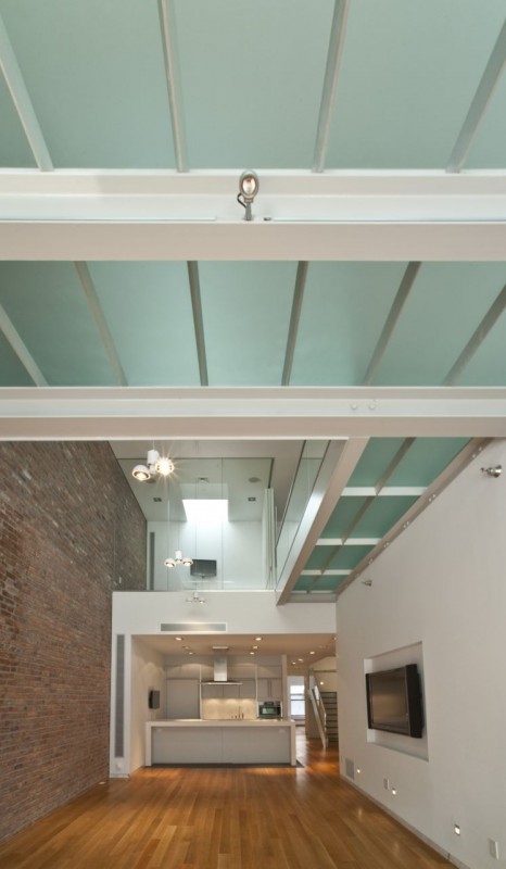 The underside of a translucent glass floor system