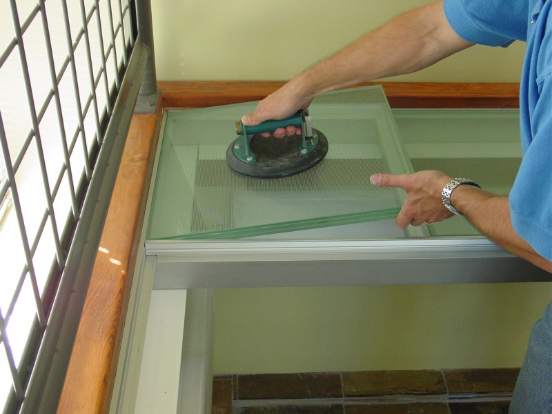 1" thick structural tempered glass floor with an aluminum grid support system 