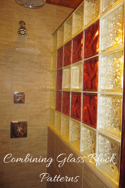 Seascapes and Decora patterns in a colored glass block shower wall 