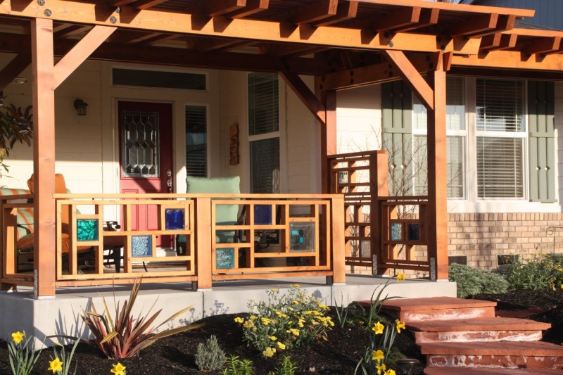 Decorative wood and glass block front porch railing 