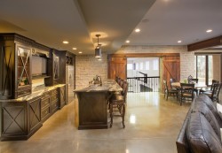 Entertainment room is visually connected to the home gym 