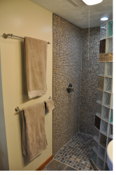 Custom fabricated shower base and glass block system