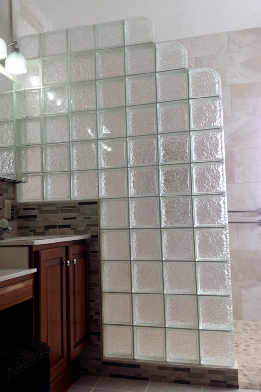 Sturdy glass block shower wall for aging in place