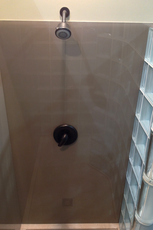 Modern mocha colored high gloss shower wall panels like back painted glass 