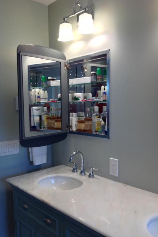 Mirrored medicine cabinets provide storage and function