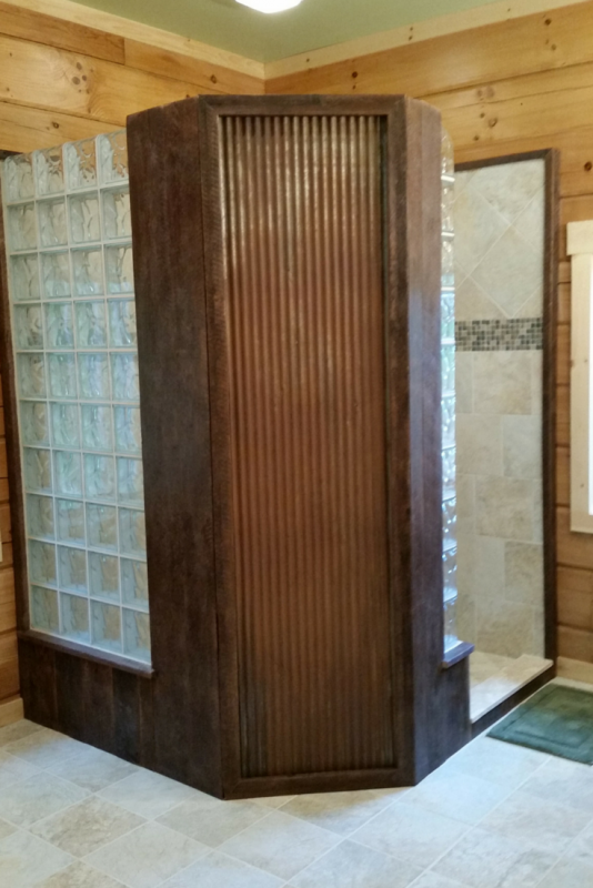 Reclaimed barnwood and galvanized metal used in a log home bathroom in Pennsylvania