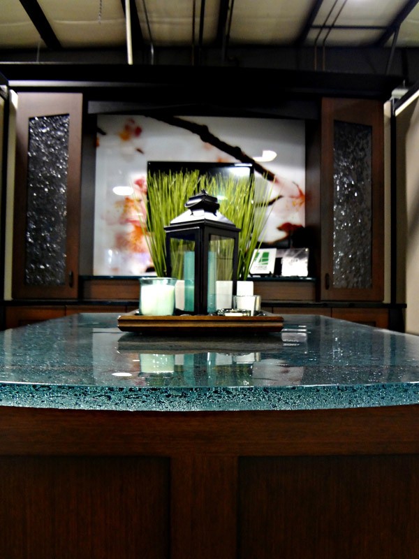 Cast glass dining room countertop with a textured bottom surface 