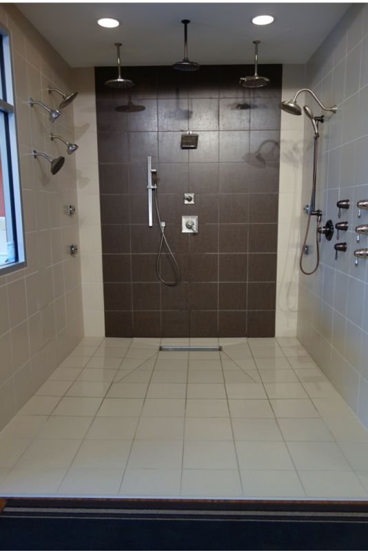 Multiple jets can be used for a spa like experience in a one level shower. The use of the linear drain with larger floor tiles in this one level system is also nice to minimize the number of grout joints in the tile floor. | Innovate Building Solutions 