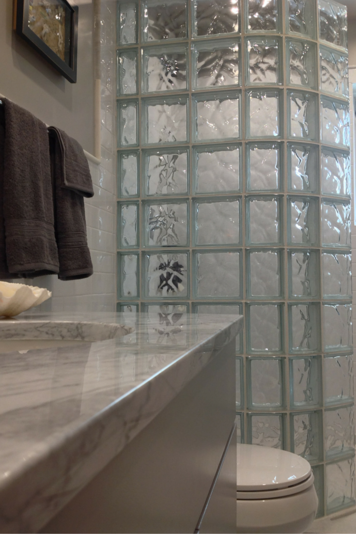 Curved glass block wall for a small tub space | Innovate Building Solutions