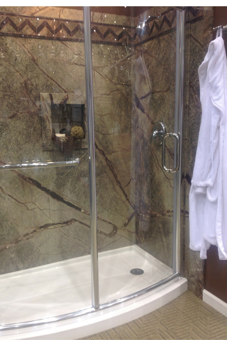 Low priced DIY faux shower wall panel system in a Rainforest pattern 