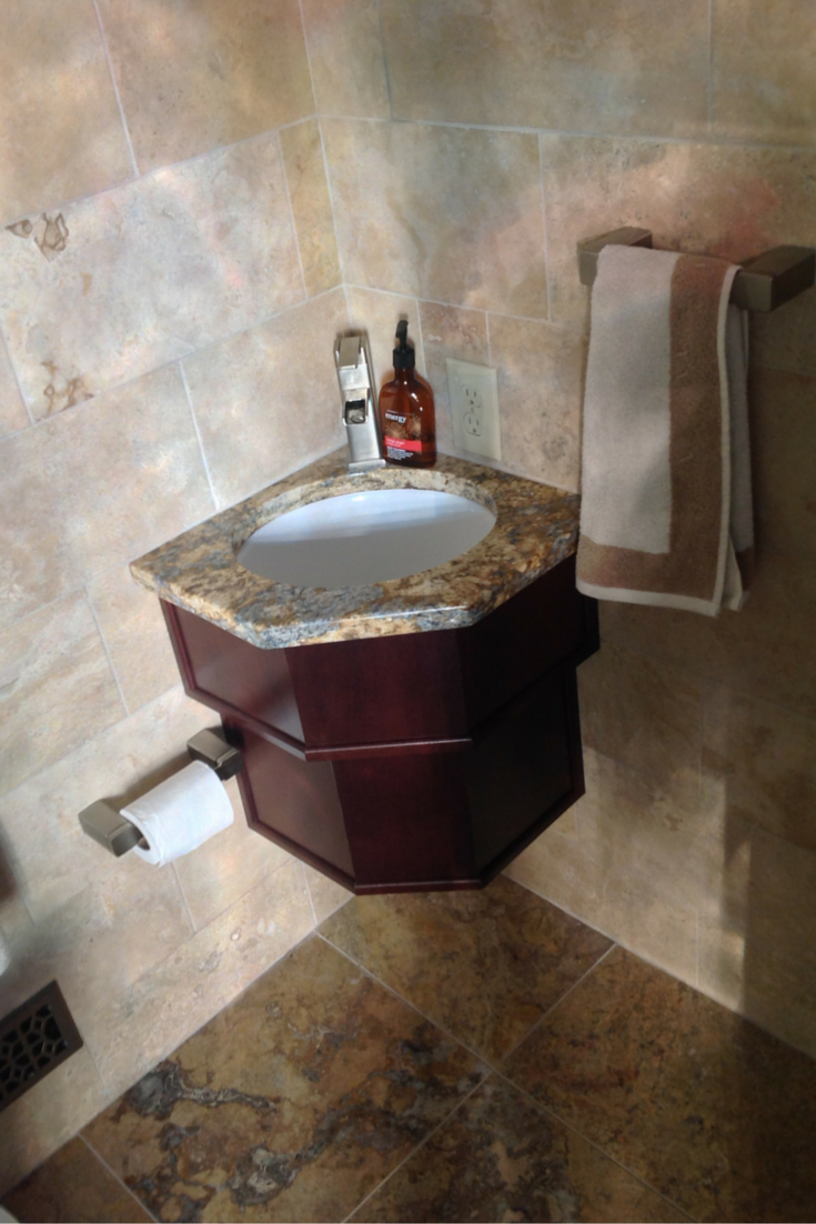 a custom built small bathroom vanity and sink for handwashing in a small columbus ohio bathroom