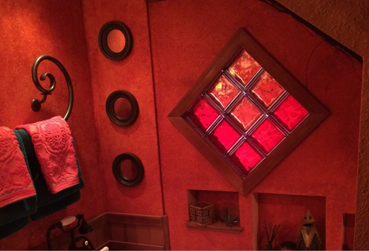 Red colored glass block window in a bath remodel in Santa Barbara California