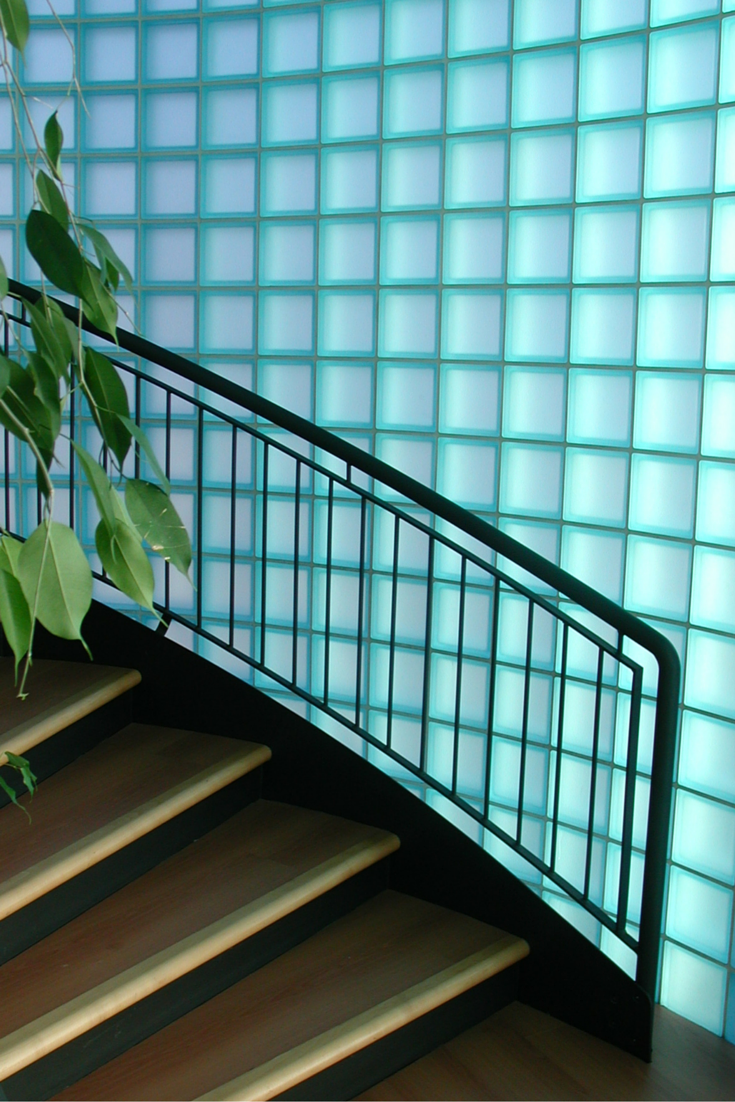 Satin finished glass block wall in an aqua color