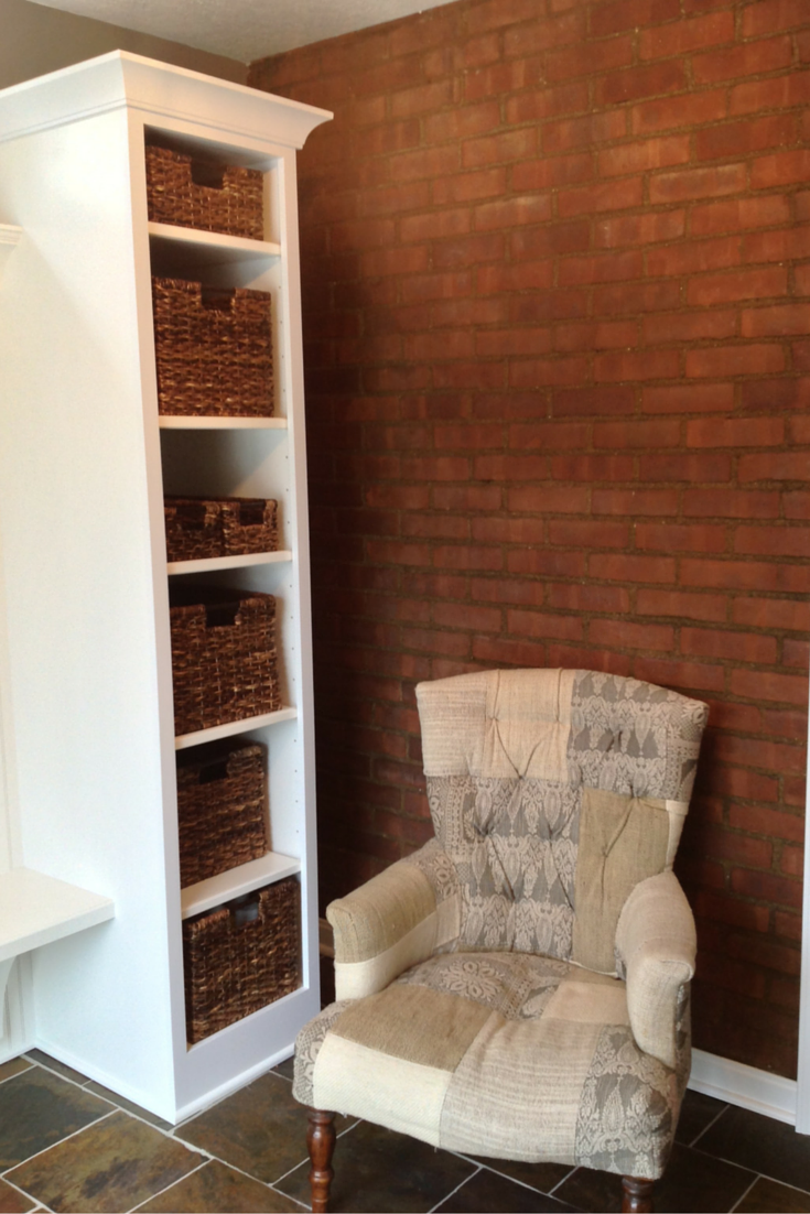 A relaxing chair in a mud room entryway in university heights ohio